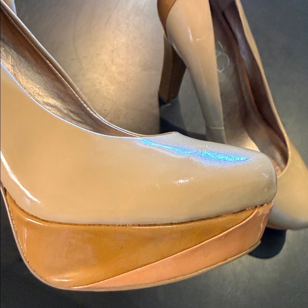 BCBG Paris Nude Patent Leather Platform Pumps
Size 6.5 - Picture 3 of 10
